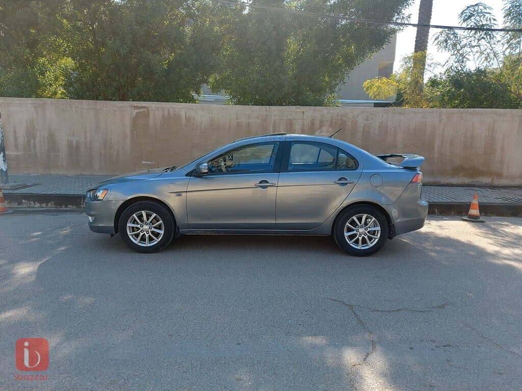Mitsubishi Lancer GLS Plus 7