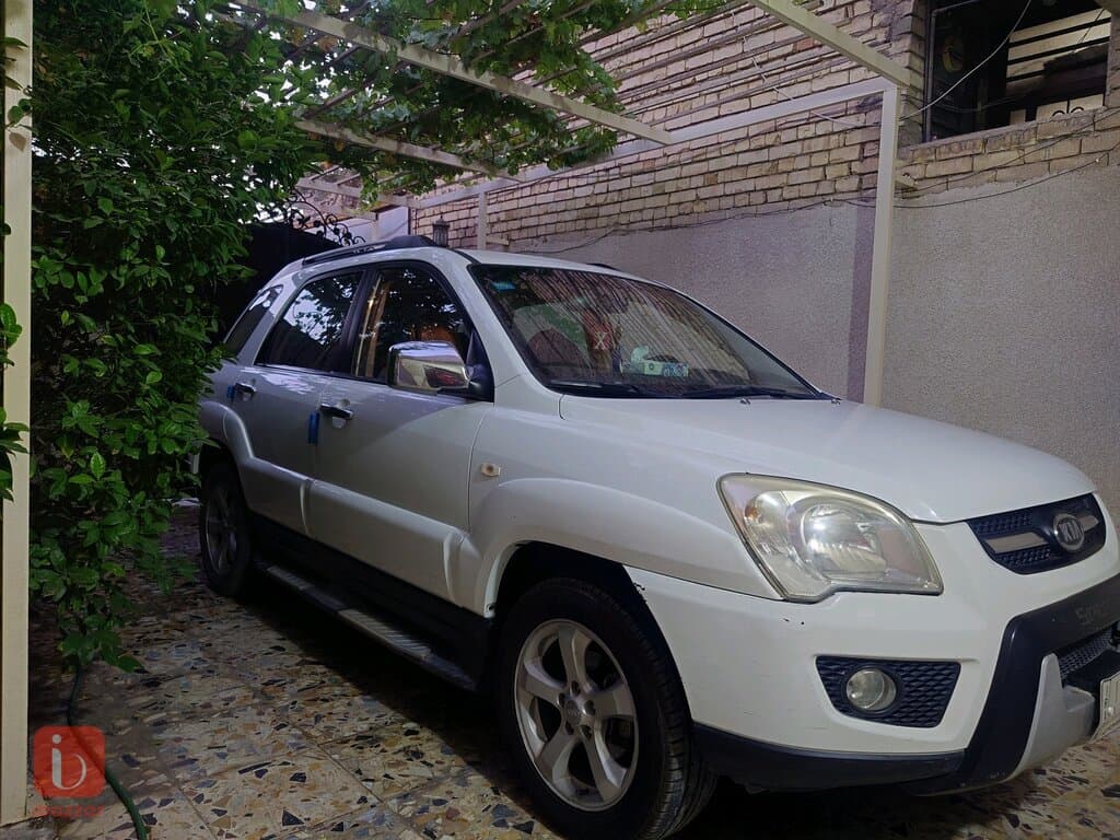 KIA Sportage LX TOP — photo 2