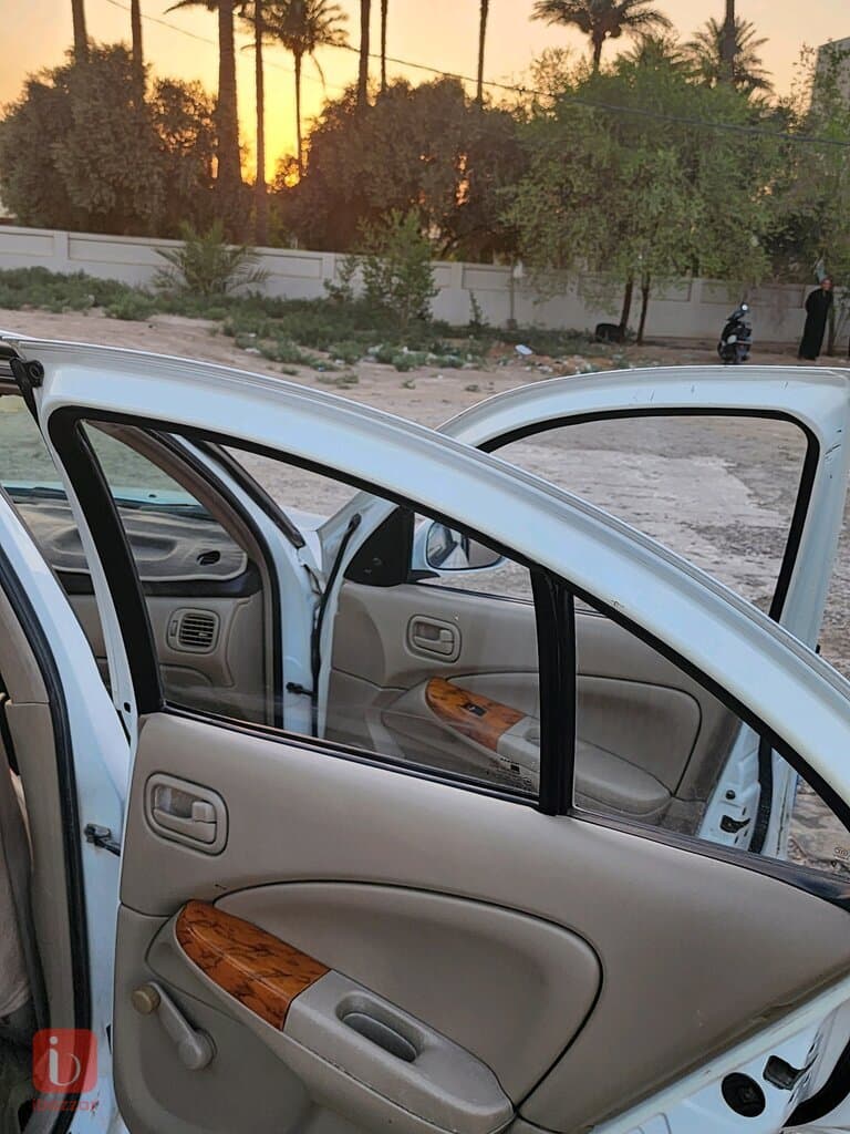 نيسان سني EX — photo 2