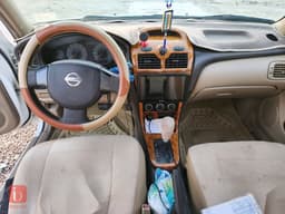 نيسان سني EX — photo 7